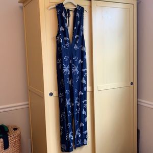 Adorable navy deep V romper.